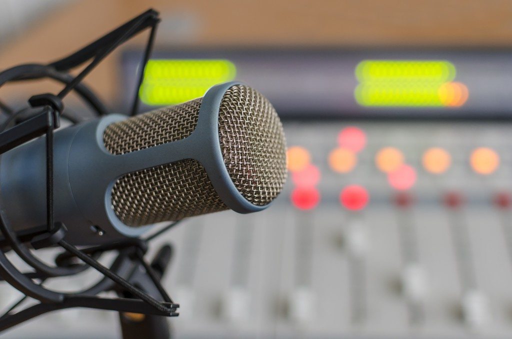 bigstock-blue-microphone-and-audio-cons-77877953-1024x678